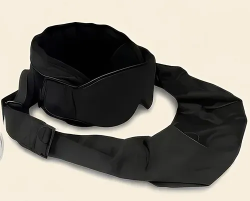 Close-up of the black sleep mask and adjustable support straps